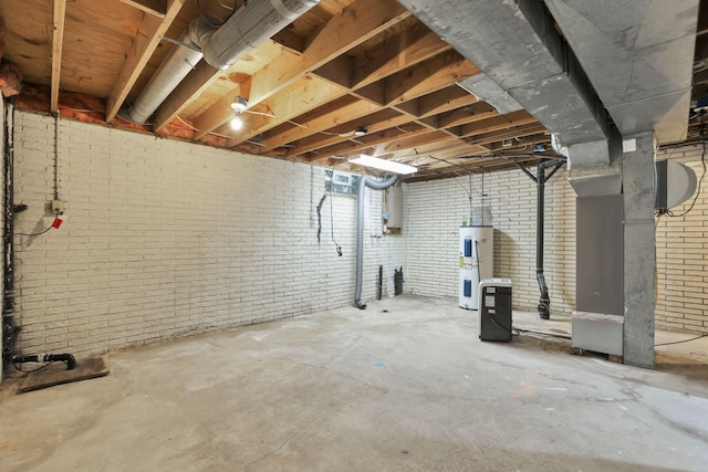 7607-7609 Penwood Pl, Columbus, OH 43235 - unfinished basement with water heater, brick wall, and heating unit