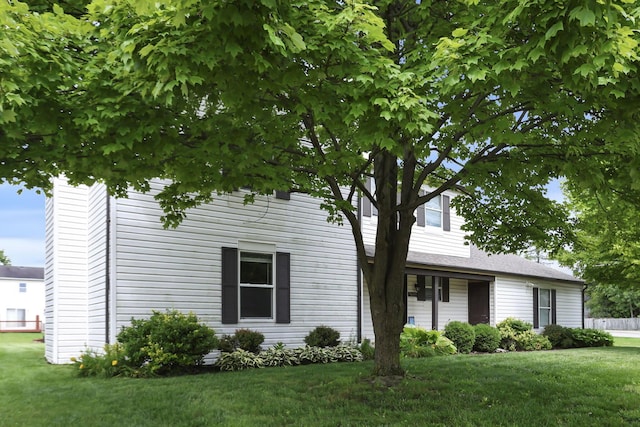 7607-7609 Penwood Pl, Columbus, OH 43235 - view of front facade featuring a front lawn