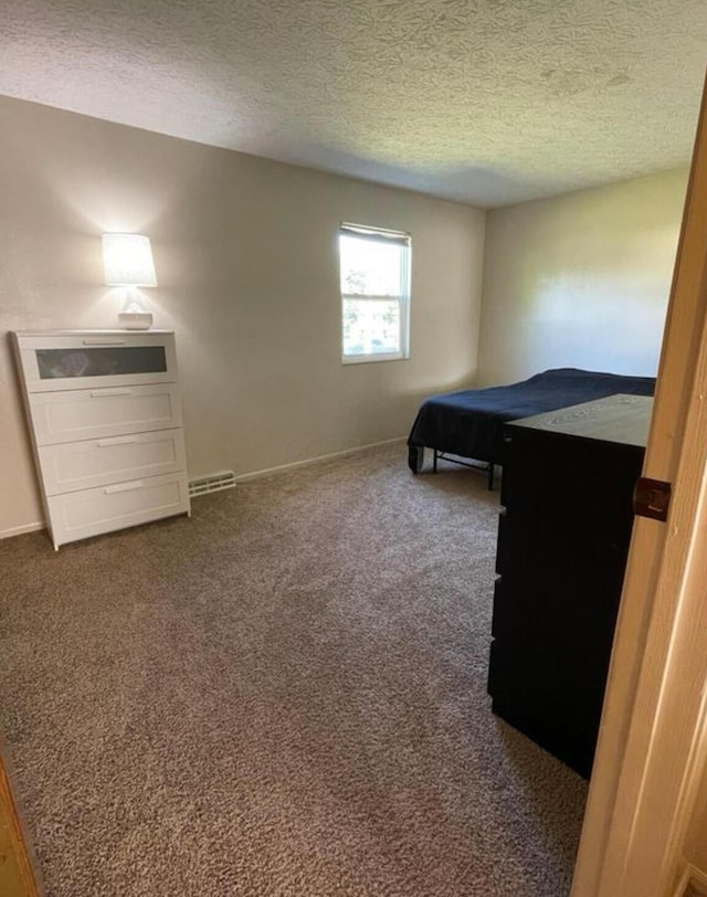 7607-7609 Penwood Pl, Columbus, OH 43235 - bedroom with dark carpet and a textured ceiling