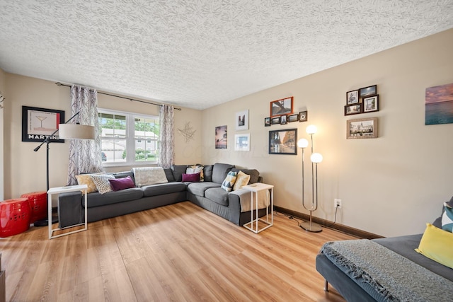 505 Tresham Rd, Columbus, OH 43230 - living area featuring light wood-type flooring and a textured ceiling