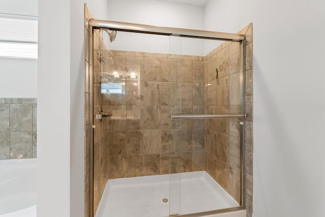 3622 Switchgrass Ct, Hilliard, OH 43026 - full bathroom with a shower stall and a bath