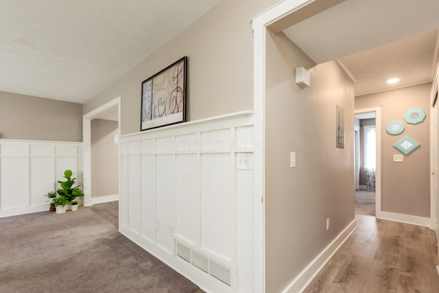 7831 Meadowhaven Blvd Unit 73, Columbus, OH 43235 - corridor with a textured ceiling and baseboards