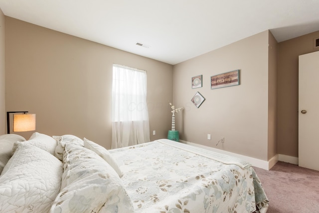 7831 Meadowhaven Blvd Unit 73, Columbus, OH 43235 - bedroom featuring light colored carpet and baseboards