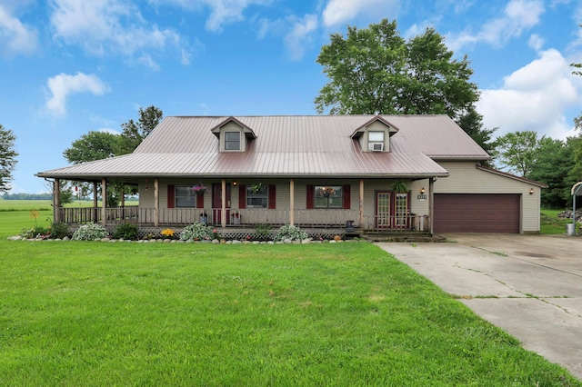 5255 State Route 138, Circleville, OH 43113 - view of front of house featuring a porch, concrete driveway, a front yard, and a metal roof