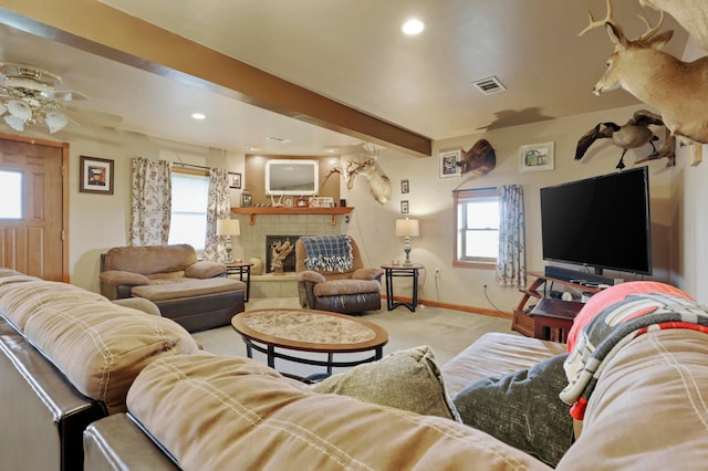 5255 State Route 138, Circleville, OH 43113 - carpeted living room with a ceiling fan, plenty of natural light, recessed lighting, a tile fireplace, and beam ceiling