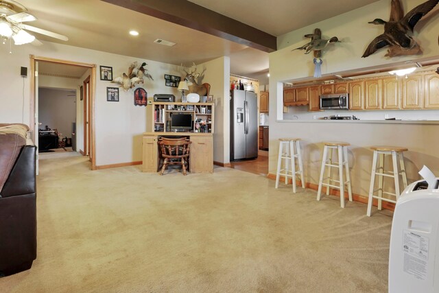 5255 State Route 138, Circleville, OH 43113 - kitchen featuring stainless steel appliances, a kitchen breakfast bar, a desk, a ceiling fan, and recessed lighting