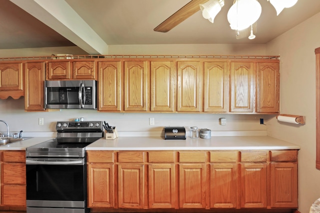 5255 State Route 138, Circleville, OH 43113 - kitchen with appliances with stainless steel finishes, light countertops, and brown cabinets