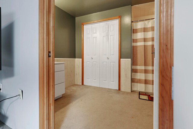 5255 State Route 138, Circleville, OH 43113 - hall with a wainscoted wall, carpet flooring, and washer / dryer