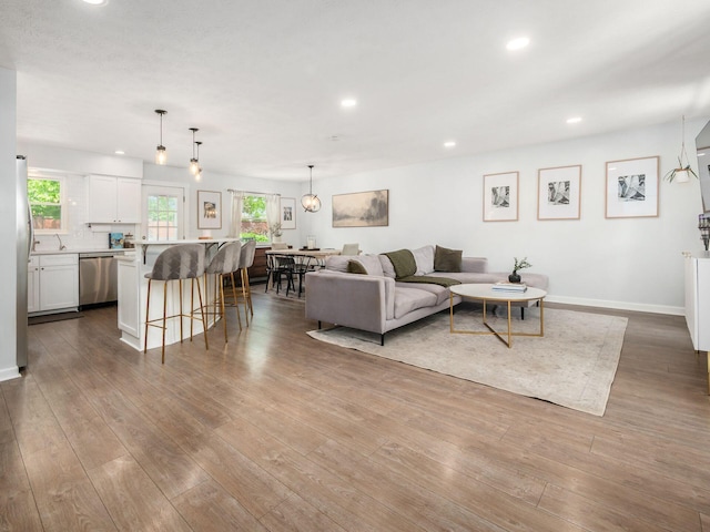 5611 Donnally Ct, Dublin, OH 43016 - living room featuring recessed lighting and wood finished floors