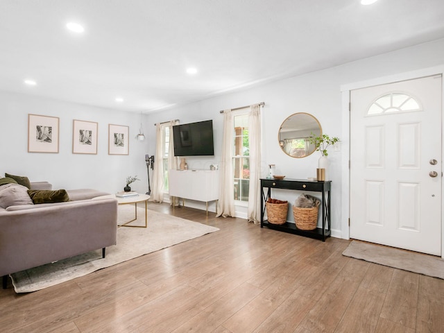 5611 Donnally Ct, Dublin, OH 43016 - living area featuring wood finished floors and recessed lighting