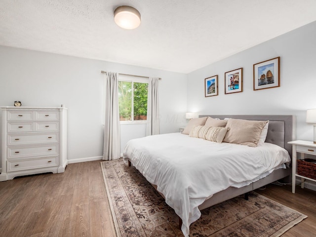 5611 Donnally Ct, Dublin, OH 43016 - bedroom with wood finished floors and baseboards