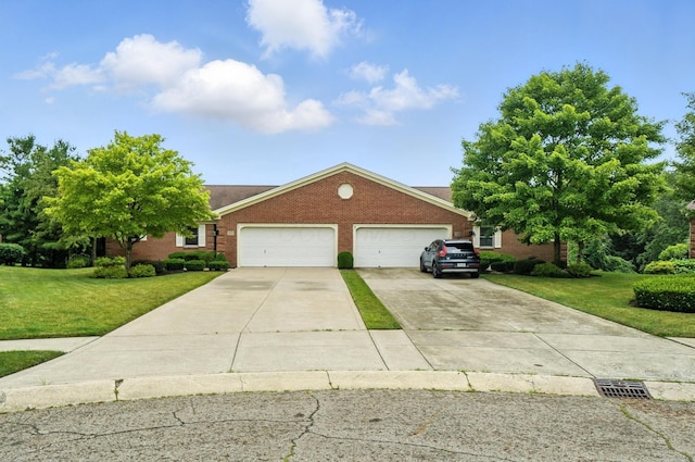 3175 Dartford Trce, Dublin, OH 43017 - view of front of home featuring a front yard, an attached garage, driveway, and brick siding