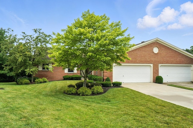 3175 Dartford Trce, Dublin, OH 43017 - obstructed view of property featuring concrete driveway, a front yard, and brick siding