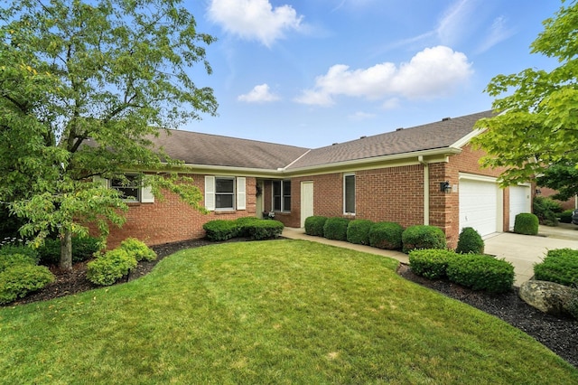 3175 Dartford Trce, Dublin, OH 43017 - ranch-style home with an attached garage, brick siding, a front lawn, concrete driveway, and a shingled roof