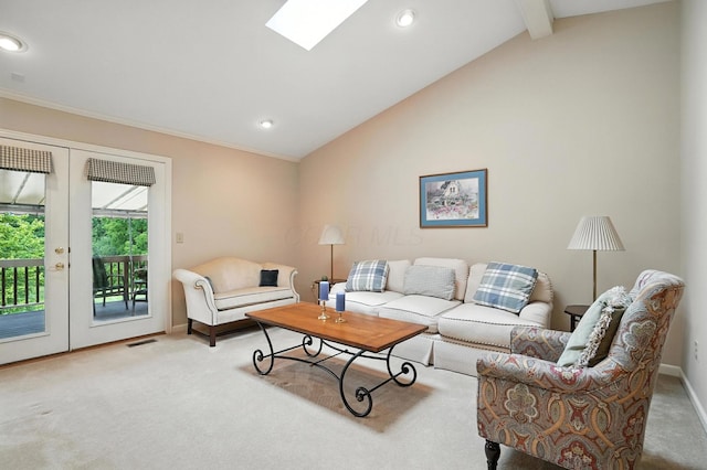 3175 Dartford Trce, Dublin, OH 43017 - living room featuring carpet flooring, french doors, recessed lighting, ornamental molding, and a skylight