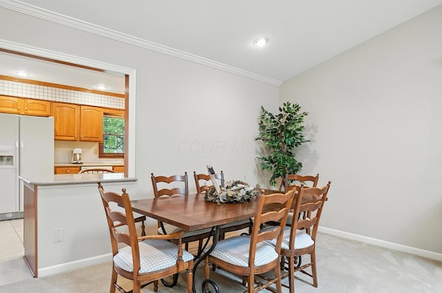 3175 Dartford Trce, Dublin, OH 43017 - dining space with crown molding, light colored carpet, and recessed lighting