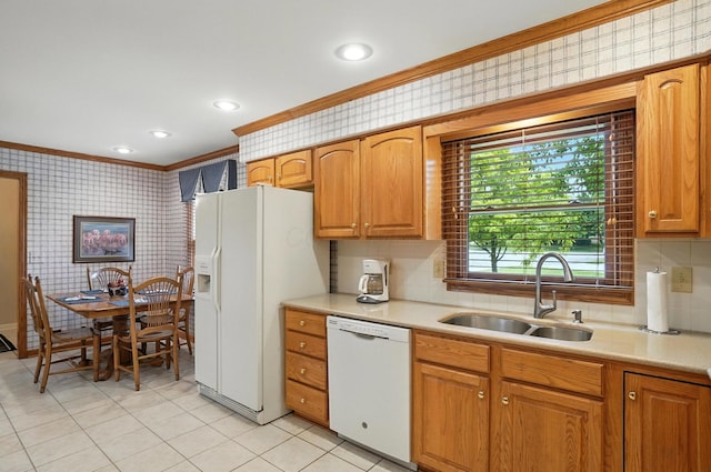 3175 Dartford Trce, Dublin, OH 43017 - kitchen with white appliances, ornamental molding, wallpapered walls, light countertops, and light tile patterned floors