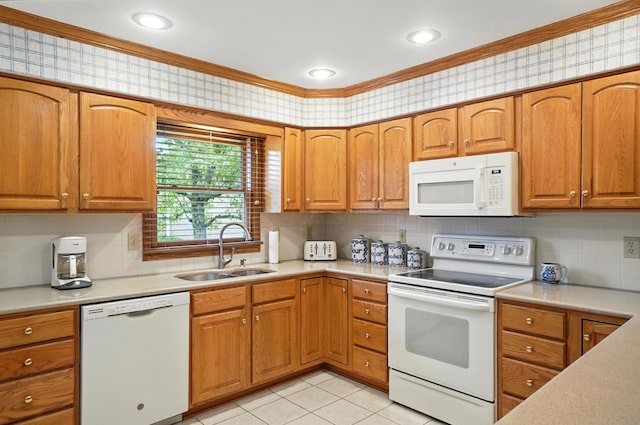 3175 Dartford Trce, Dublin, OH 43017 - kitchen with white appliances, crown molding, light countertops, decorative backsplash, and brown cabinetry