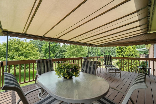 3175 Dartford Trce, Dublin, OH 43017 - deck featuring outdoor dining space and view of wooded area