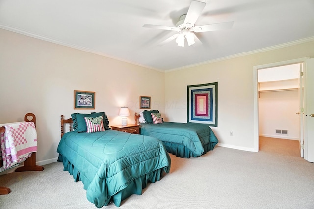3175 Dartford Trce, Dublin, OH 43017 - carpeted bedroom featuring ornamental molding, a walk in closet, and a ceiling fan