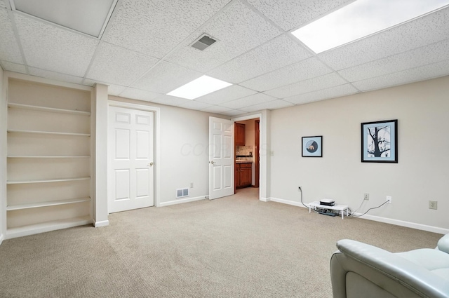 3175 Dartford Trce, Dublin, OH 43017 - sitting room with light carpet, built in features, and a paneled ceiling