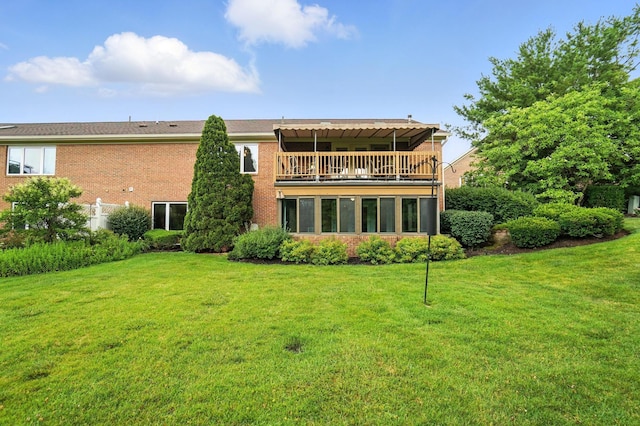 3175 Dartford Trce, Dublin, OH 43017 - back of house with a balcony, a yard, and brick siding