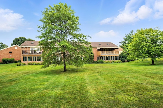 3175 Dartford Trce, Dublin, OH 43017 - view of green lawn with a balcony