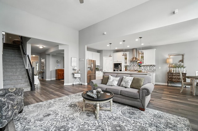 618 Ludham Trl, Pickerington, OH 43147 - living area with dark wood-style floors, stairway, and recessed lighting