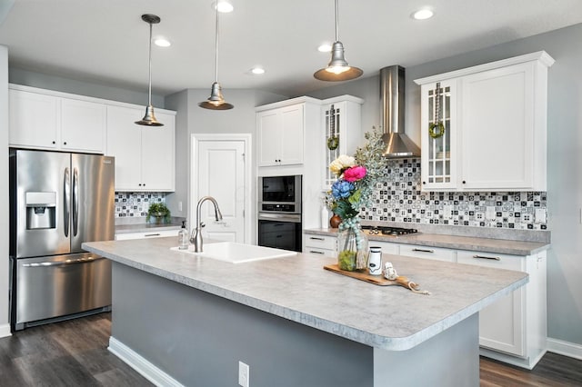 618 Ludham Trl, Pickerington, OH 43147 - kitchen with appliances with stainless steel finishes, dark wood-style flooring, light countertops, backsplash, and recessed lighting