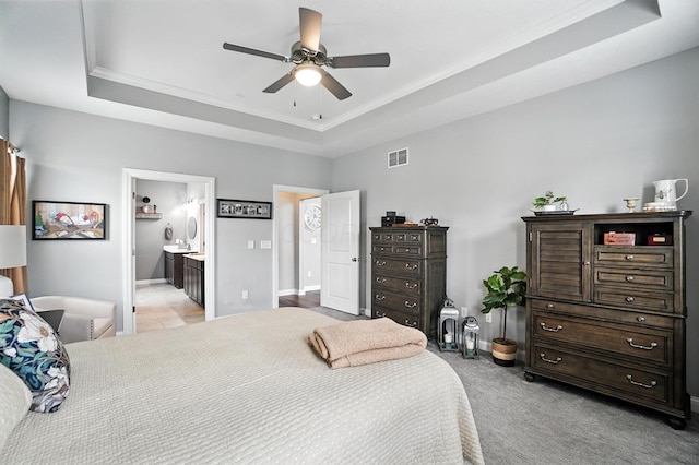 618 Ludham Trl, Pickerington, OH 43147 - bedroom with a raised ceiling, light carpet, connected bathroom, crown molding, and a ceiling fan