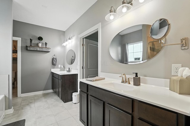 618 Ludham Trl, Pickerington, OH 43147 - bathroom featuring toilet and two vanities