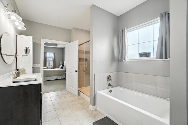 618 Ludham Trl, Pickerington, OH 43147 - ensuite bathroom with a bath, a stall shower, double vanity, and tile patterned floors