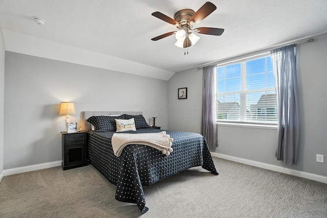 618 Ludham Trl, Pickerington, OH 43147 - bedroom with light carpet, vaulted ceiling, ceiling fan, and a textured ceiling