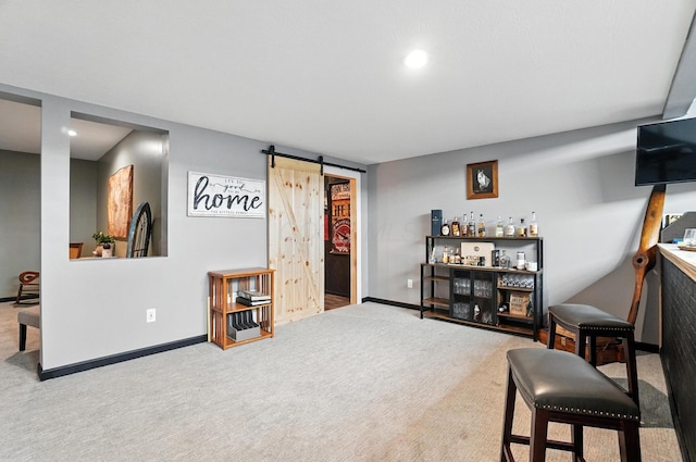 618 Ludham Trl, Pickerington, OH 43147 - sitting room featuring a barn door, a bar, carpet, and recessed lighting