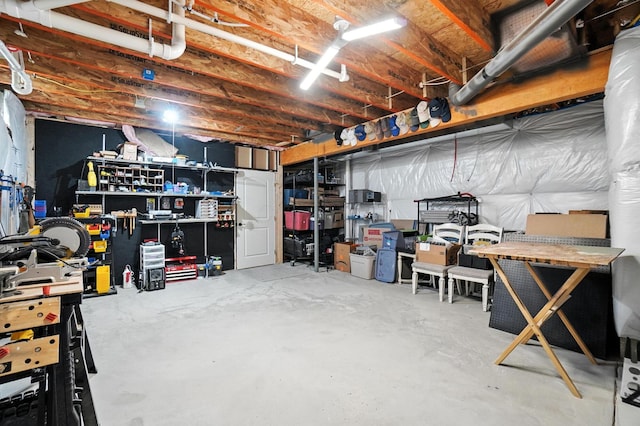 618 Ludham Trl, Pickerington, OH 43147 - unfinished basement with a workshop area
