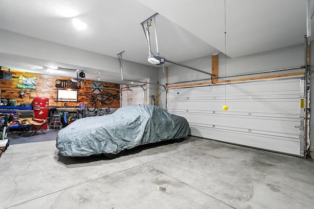 618 Ludham Trl, Pickerington, OH 43147 - garage with a garage door opener and wood walls