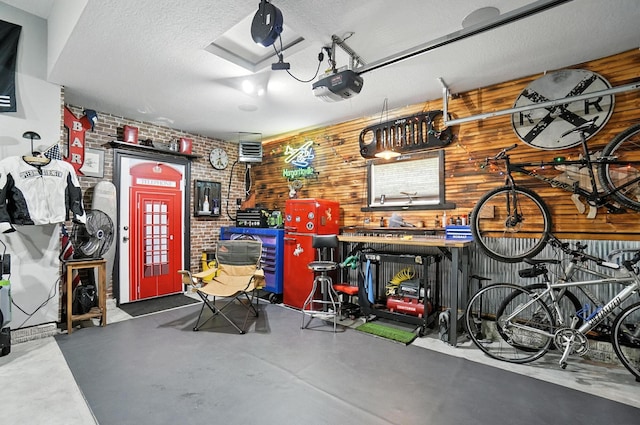 618 Ludham Trl, Pickerington, OH 43147 - garage with wood walls and a garage door opener