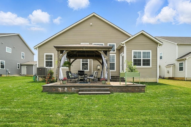 618 Ludham Trl, Pickerington, OH 43147 - back of house featuring a gazebo, a lawn, and a patio
