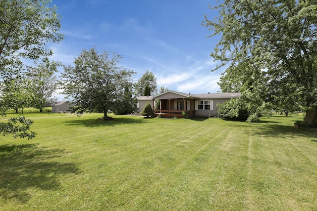 6471 Graham Rd, Mount Vernon, OH 43050 - view of green lawn featuring covered porch