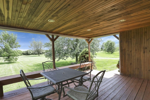 6471 Graham Rd, Mount Vernon, OH 43050 - wooden deck with outdoor dining space and a lawn