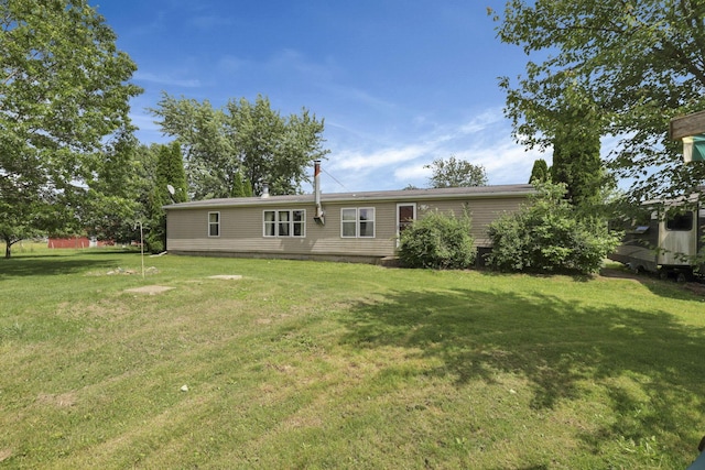 6471 Graham Rd, Mount Vernon, OH 43050 - rear view of property with a yard