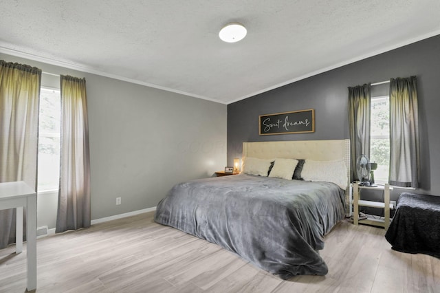 6471 Graham Rd, Mount Vernon, OH 43050 - bedroom with multiple windows, ornamental molding, wood finished floors, a textured ceiling, and vaulted ceiling