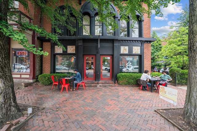 117 E Frankfort St, Columbus, OH 43206 - rear view of house with brick siding and french doors
