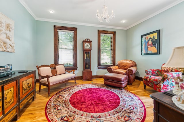 117 E Frankfort St, Columbus, OH 43206 - sitting room featuring a chandelier, crown molding, and light wood-style flooring