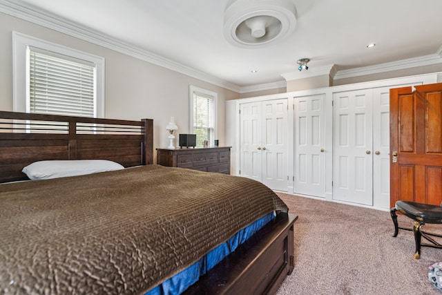 117 E Frankfort St, Columbus, OH 43206 - carpeted bedroom with multiple closets and ornamental molding