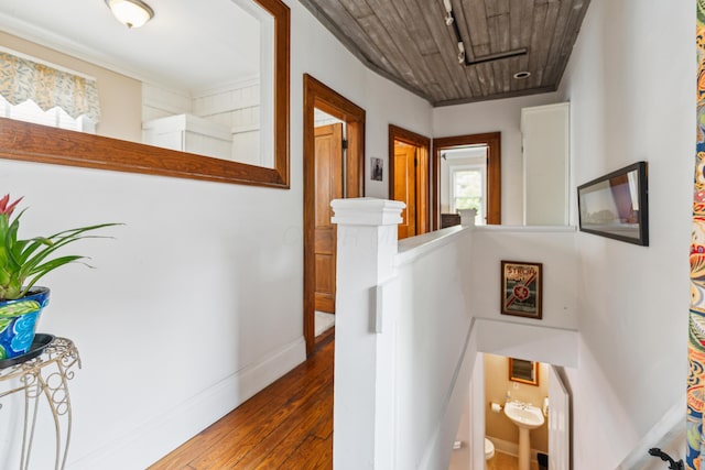 117 E Frankfort St, Columbus, OH 43206 - hallway featuring an upstairs landing, attic access, and dark wood-style flooring