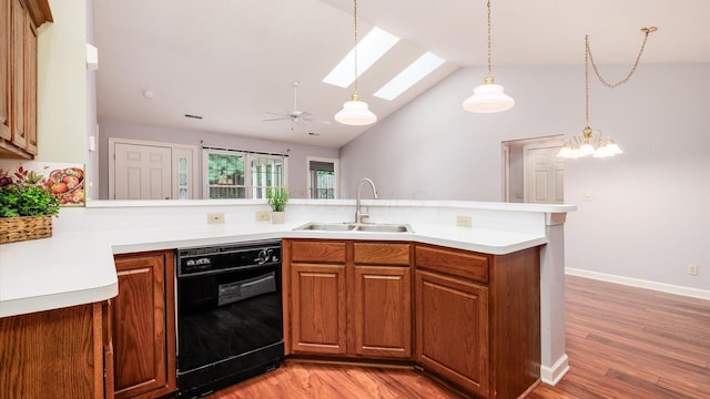 74 Stonington Cir, Newark, OH 43055 - kitchen with dishwasher, a skylight, light wood-style flooring, light countertops, and lofted ceiling