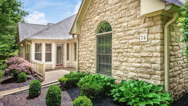 74 Stonington Cir, Newark, OH 43055 - property entrance with stone siding and a shingled roof