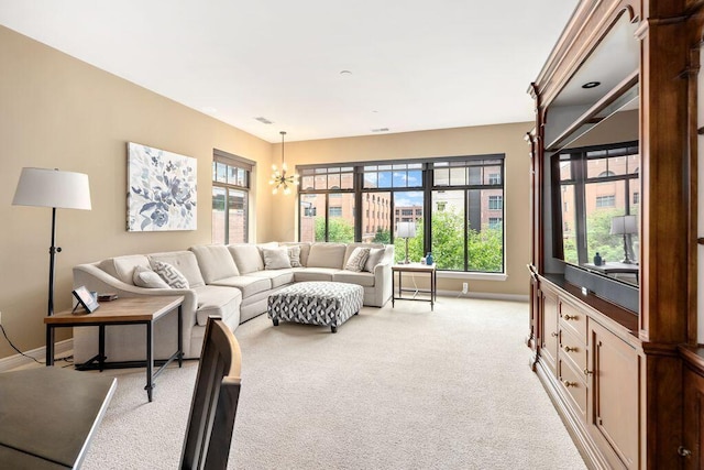 250 Daniel Burnham Sq Unit 402, Columbus, OH 43215 - living area featuring light colored carpet and a chandelier