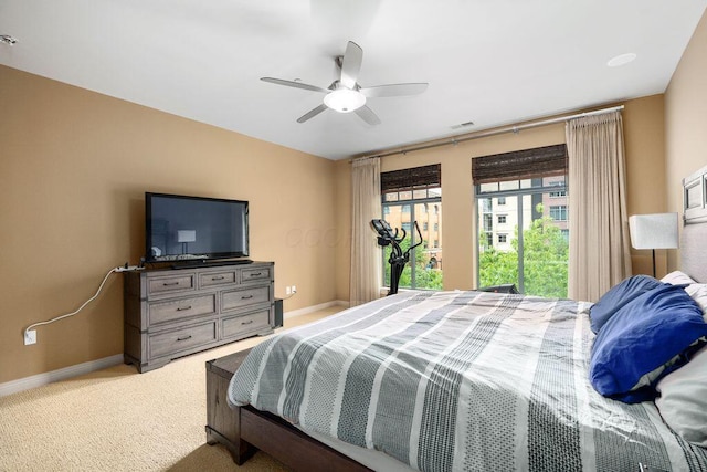 250 Daniel Burnham Sq Unit 402, Columbus, OH 43215 - carpeted bedroom with baseboards and a ceiling fan